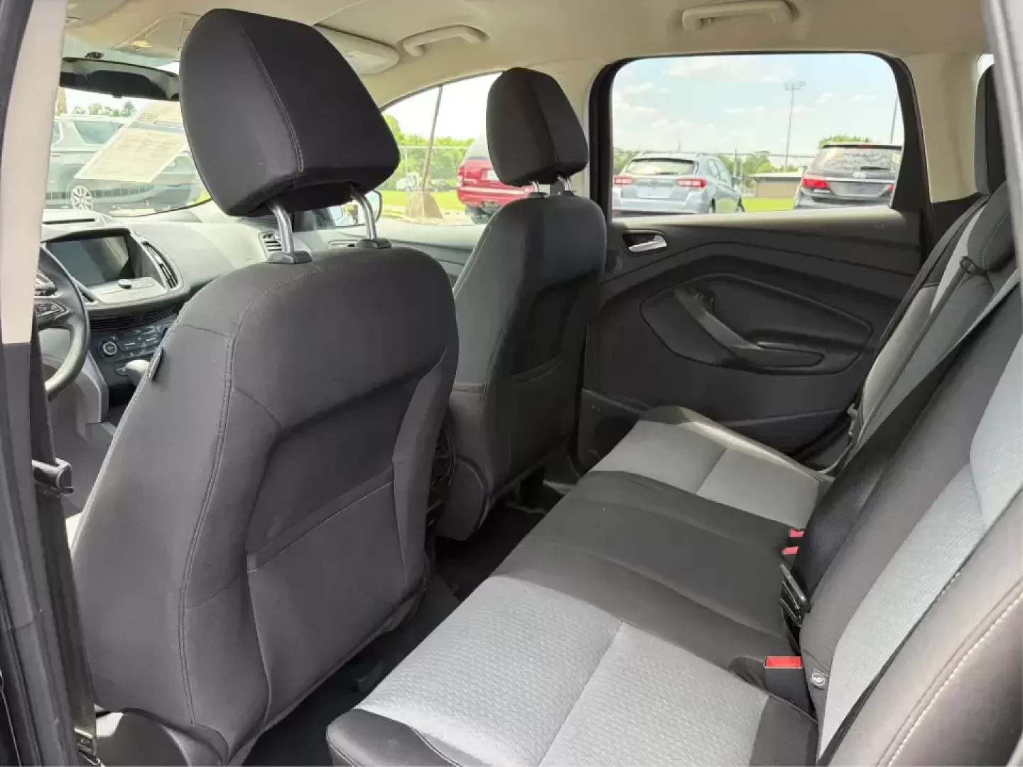 2017 Ford Escape SE FWD (1FMCU0GD1HU) with an 1.5L L4 DOHC 16V engine, 6A transmission, located at 880 E. National Road, Vandalia, OH, 45377, (937) 908-9800, 39.891918, -84.183594 - Picture your next week: a smooth commute down I75, a quick run to the Dayton Mall, and a weekend getaway with room for groceries, gear, and friends-all in one easy-to-drive SUV. This 2017 Ford Escape SE in Shadow Black is a smart fit for busy families, first-time buyers, and anyone who wants a pract - Photo#10