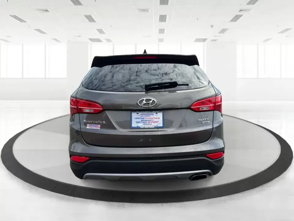 2014 Hyundai Santa Fe Sport 2.4 AWD (5XYZUDLB0EG) with an 2.4L L4 DOHC 16V engine, 6-Speed Automatic transmission, located at 4508 South Dixie Dr, Moraine, OH, 45439, (937) 908-9800, 39.689976, -84.218452 - Picture your next weekend escape: loading up the family, pointing the nose toward the MetroParks, and cruising I-75 with room for everyone and everything-without feeling like you're driving a bus. This 2014 Hyundai Santa Fe 2.4L in Cabo Bronze is a practical, road-trip-ready SUV that fits real life - Photo#3