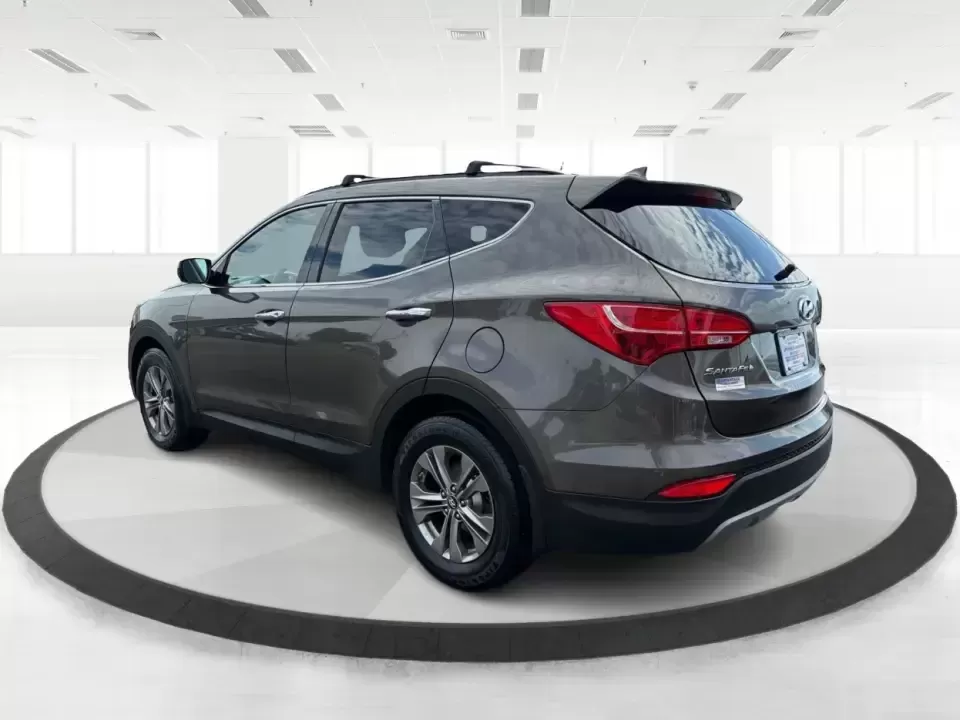 2014 Hyundai Santa Fe Sport 2.4 AWD (5XYZUDLB0EG) with an 2.4L L4 DOHC 16V engine, 6-Speed Automatic transmission, located at 4508 South Dixie Dr, Moraine, OH, 45439, (937) 908-9800, 39.689976, -84.218452 - Picture your next weekend escape: loading up the family, pointing the nose toward the MetroParks, and cruising I-75 with room for everyone and everything-without feeling like you're driving a bus. This 2014 Hyundai Santa Fe 2.4L in Cabo Bronze is a practical, road-trip-ready SUV that fits real life - Photo#4