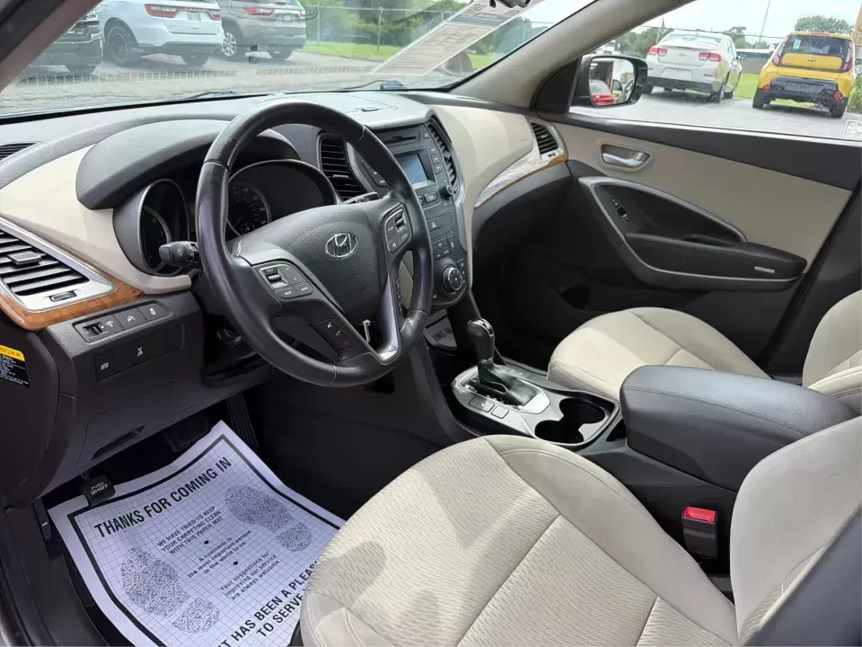 2014 Hyundai Santa Fe Sport 2.4 AWD (5XYZUDLB0EG) with an 2.4L L4 DOHC 16V engine, 6-Speed Automatic transmission, located at 4508 South Dixie Dr, Moraine, OH, 45439, (937) 908-9800, 39.689976, -84.218452 - Picture your next weekend escape: loading up the family, pointing the nose toward the MetroParks, and cruising I-75 with room for everyone and everything-without feeling like you're driving a bus. This 2014 Hyundai Santa Fe 2.4L in Cabo Bronze is a practical, road-trip-ready SUV that fits real life - Photo#9