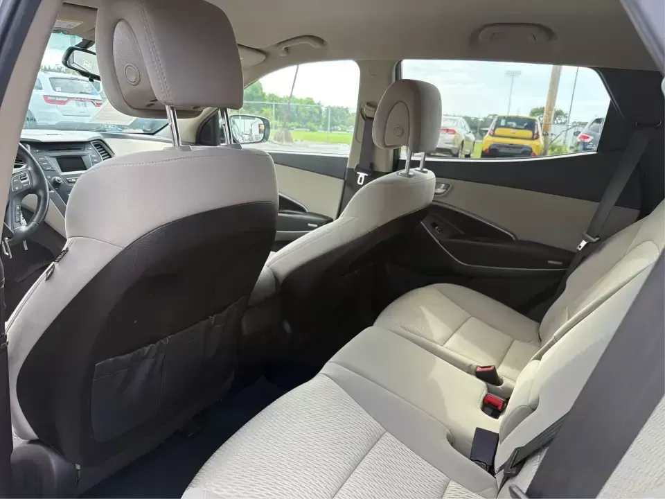 2014 Hyundai Santa Fe Sport 2.4 AWD (5XYZUDLB0EG) with an 2.4L L4 DOHC 16V engine, 6-Speed Automatic transmission, located at 4508 South Dixie Dr, Moraine, OH, 45439, (937) 908-9800, 39.689976, -84.218452 - Picture your next weekend escape: loading up the family, pointing the nose toward the MetroParks, and cruising I-75 with room for everyone and everything-without feeling like you're driving a bus. This 2014 Hyundai Santa Fe 2.4L in Cabo Bronze is a practical, road-trip-ready SUV that fits real life - Photo#10