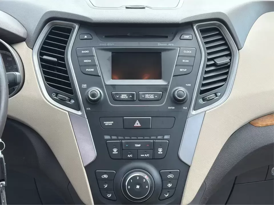 2014 Hyundai Santa Fe Sport 2.4 AWD (5XYZUDLB0EG) with an 2.4L L4 DOHC 16V engine, 6-Speed Automatic transmission, located at 4508 South Dixie Dr, Moraine, OH, 45439, (937) 908-9800, 39.689976, -84.218452 - Picture your next weekend escape: loading up the family, pointing the nose toward the MetroParks, and cruising I-75 with room for everyone and everything-without feeling like you're driving a bus. This 2014 Hyundai Santa Fe 2.4L in Cabo Bronze is a practical, road-trip-ready SUV that fits real life - Photo#13