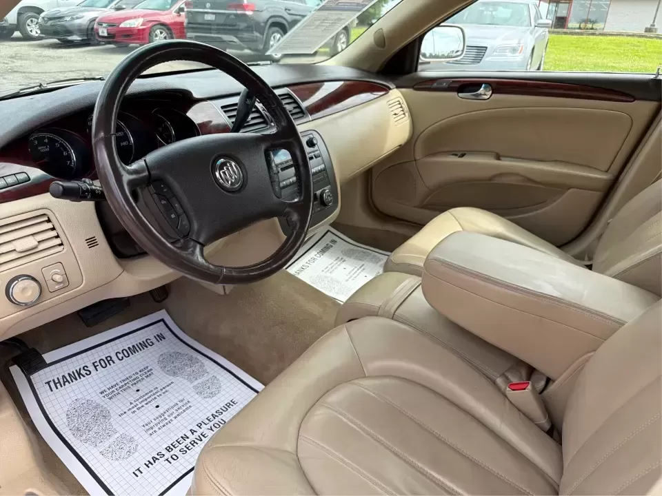 2009 Buick Lucerne CXL1 (1G4HD57M99U) with an 3.9L V6 OHV 12V engine, 4-Speed Automatic transmission, located at 4508 South Dixie Dr, Moraine, OH, 45439, (937) 908-9800, 39.689976, -84.218452 - Dreaming of a comfortable, quiet sedan for long commutes down I75, school drop-offs around Moraine, or easy weekend cruises to Carillon Historical Park and the Dayton Art Institute? This 2009 Buick Lucerne CXL is built for drivers who want classic full-size comfort, a smooth V6 ride, and upscale fea - Photo#9