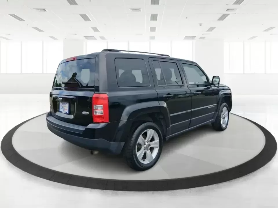 2016 Jeep Patriot Latitude 4WD (1C4NJRFB0GD) with an 2.4L L4 DOHC 16V engine, located at 1230 East Main St, Xenia, OH, 45385, (937) 908-9800, 39.688026, -83.910172 - Weekday commute down US-35, school drop-offs near Shawnee Park, and spontaneous weekend escapes to Caesar Creek State Park-this 2016 Jeep Patriot Latitude is built for the kind of Ohio lifestyle that mixes practical errands with let's get out of town freedom. Finished in Black Clearcoat and sized ju - Photo#2