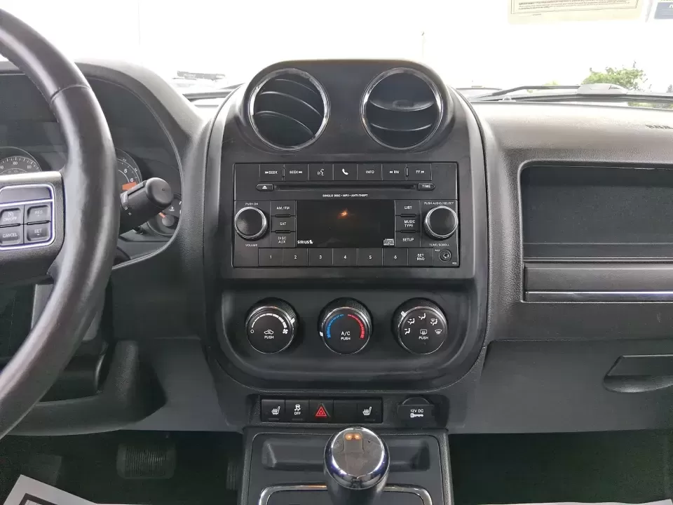 2016 Jeep Patriot Latitude 4WD (1C4NJRFB0GD) with an 2.4L L4 DOHC 16V engine, located at 1230 East Main St, Xenia, OH, 45385, (937) 908-9800, 39.688026, -83.910172 - Weekday commute down US-35, school drop-offs near Shawnee Park, and spontaneous weekend escapes to Caesar Creek State Park-this 2016 Jeep Patriot Latitude is built for the kind of Ohio lifestyle that mixes practical errands with let's get out of town freedom. Finished in Black Clearcoat and sized ju - Photo#13