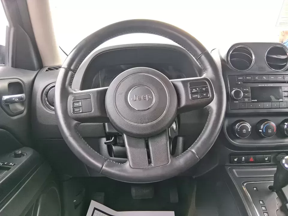 2016 Jeep Patriot Latitude 4WD (1C4NJRFB0GD) with an 2.4L L4 DOHC 16V engine, located at 1230 East Main St, Xenia, OH, 45385, (937) 908-9800, 39.688026, -83.910172 - Weekday commute down US-35, school drop-offs near Shawnee Park, and spontaneous weekend escapes to Caesar Creek State Park-this 2016 Jeep Patriot Latitude is built for the kind of Ohio lifestyle that mixes practical errands with let's get out of town freedom. Finished in Black Clearcoat and sized ju - Photo#16