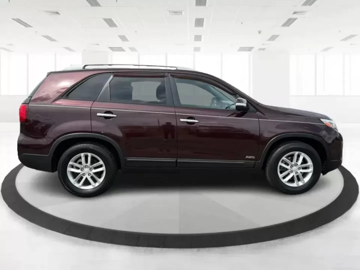2015 Kia Sorento LX (5XYKTCA66FG) with an 2.4L I-4 gasoline direct injection engine, 6-Speed Automatic transmission, located at 401 Woodman Dr, Riverside, OH, 45431, (937) 908-9800, 39.760899, -84.123421 - Pack up the kids, load the cooler, and point the GPS toward your next weekend escape-this 2015 Kia Sorento LX in Dark Cherry is the kind of practical SUV that fits real-life routines in Riverside, Ohio. Whether you're juggling school drop-offs, commuting down I-675, or heading out for a day at Caril - Photo#1