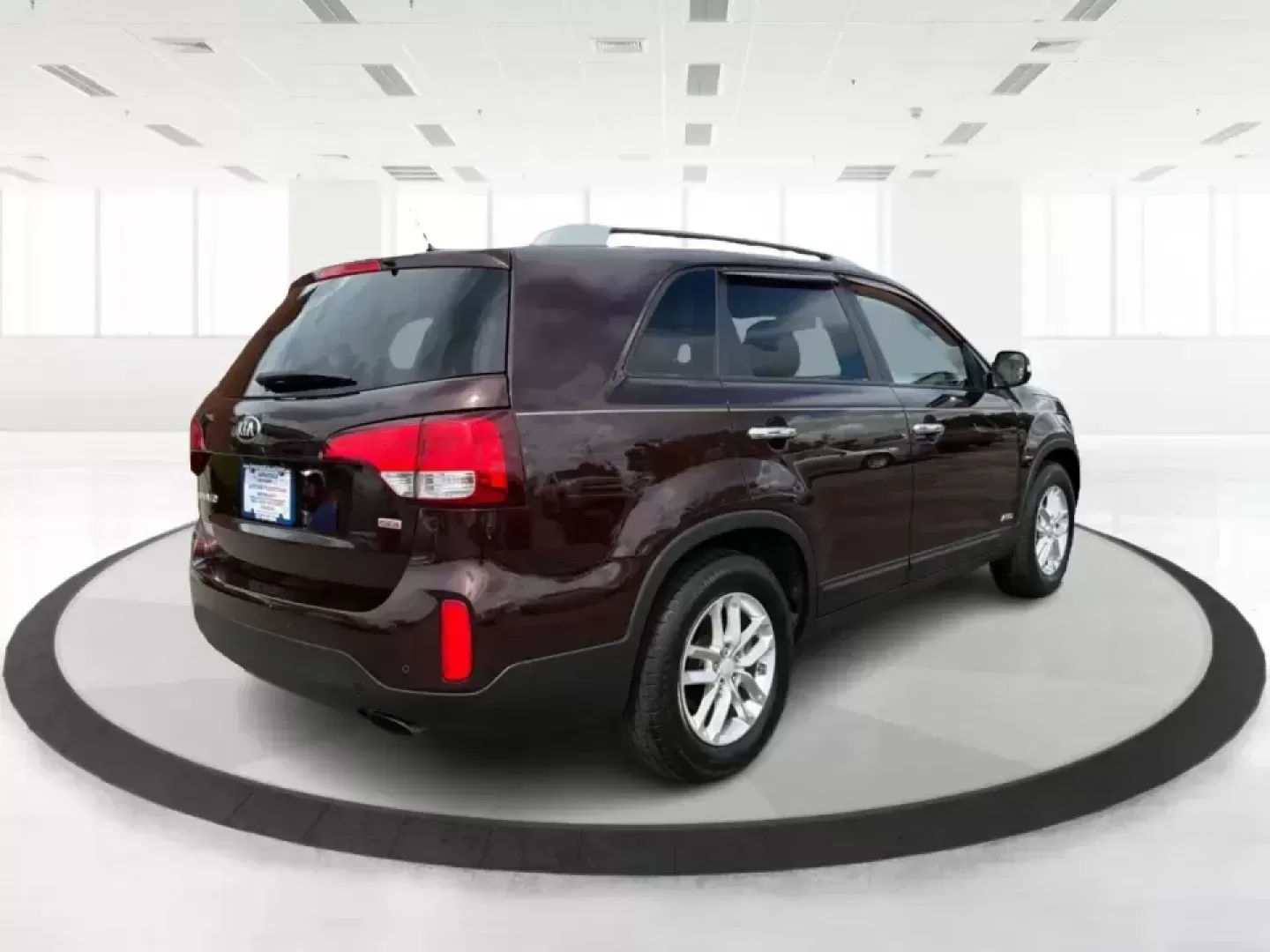 2015 Kia Sorento LX (5XYKTCA66FG) with an 2.4L I-4 gasoline direct injection engine, 6-Speed Automatic transmission, located at 401 Woodman Dr, Riverside, OH, 45431, (937) 908-9800, 39.760899, -84.123421 - Pack up the kids, load the cooler, and point the GPS toward your next weekend escape-this 2015 Kia Sorento LX in Dark Cherry is the kind of practical SUV that fits real-life routines in Riverside, Ohio. Whether you're juggling school drop-offs, commuting down I-675, or heading out for a day at Caril - Photo#2