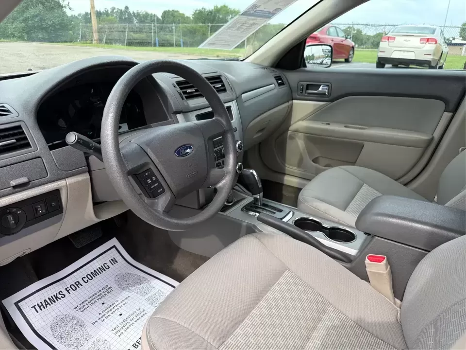 2012 Ford Fusion S (3FAHP0GA0CR) with an 2.5L L4 DOHC 16V engine, located at 1099 N County Rd 25A , Troy, OH, 45373, (937) 908-9800, 40.057079, -84.212883 - Need a reliable commuter that still feels comfortable for weekend getaways and everyday errands around Troy? This 2012 Ford Fusion S sedan is a smart pick for drivers who want a dependable, easy-to-live-with car for trips down I75, quick runs to the Troy Community Center, or relaxed evenings cruisin - Photo#9