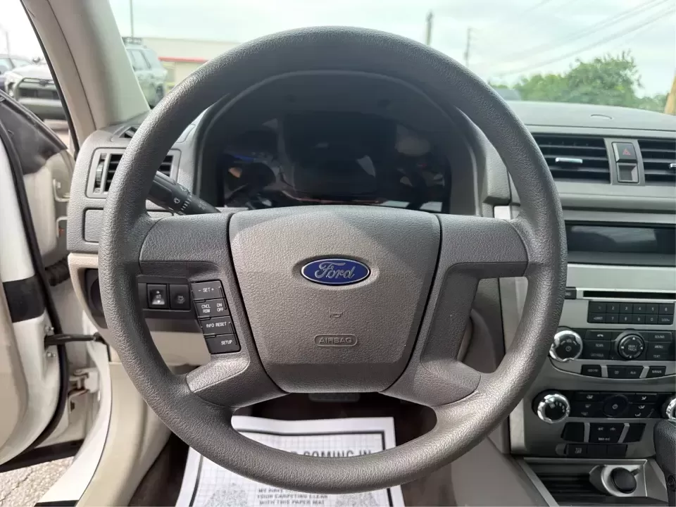 2012 Ford Fusion S (3FAHP0GA0CR) with an 2.5L L4 DOHC 16V engine, located at 1099 N County Rd 25A , Troy, OH, 45373, (937) 908-9800, 40.057079, -84.212883 - Need a reliable commuter that still feels comfortable for weekend getaways and everyday errands around Troy? This 2012 Ford Fusion S sedan is a smart pick for drivers who want a dependable, easy-to-live-with car for trips down I75, quick runs to the Troy Community Center, or relaxed evenings cruisin - Photo#16