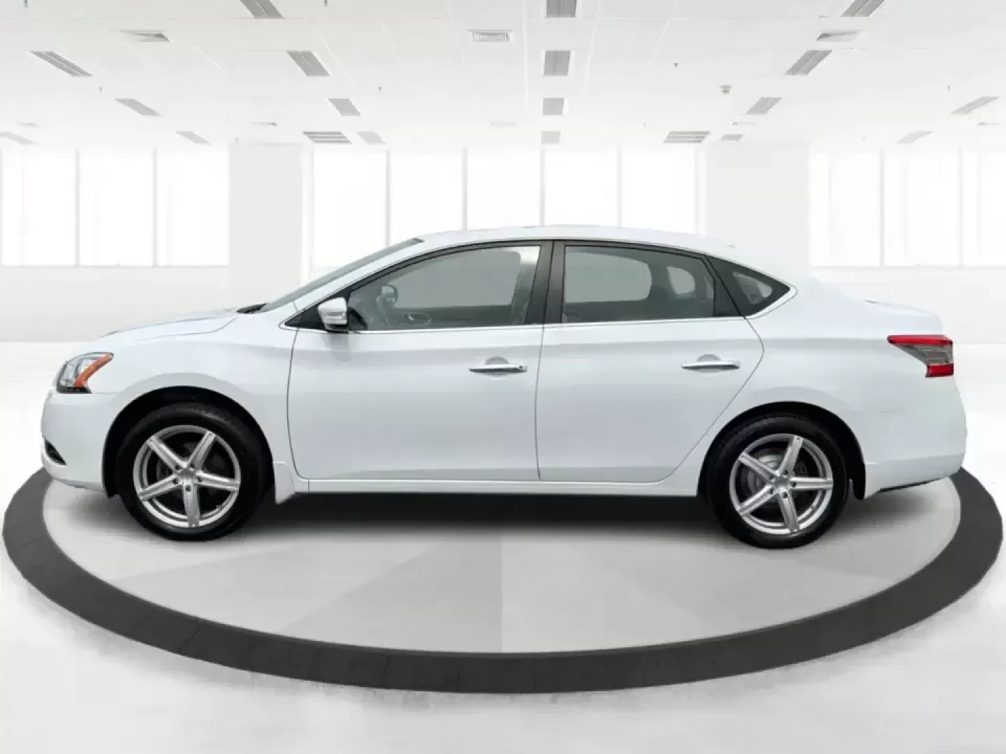 2014 Nissan Sentra SL (3N1AB7AP6EY) with an 1.8L I-4 DOHC engine, 6-Speed Manual transmission, located at 1099 N County Rd 25A , Troy, OH, 45373, (937) 908-9800, 40.057079, -84.212883 - Need a dependable commuter that's easy to park downtown, sips regular unleaded, and still feels comfortable for weekend getaways? This 2014 Nissan Sentra SL in Aspen White is a smart pick for Troy-area drivers who want a practical sedan with upscale touches and a driver-engaged feel thanks to its 6- - Photo#5