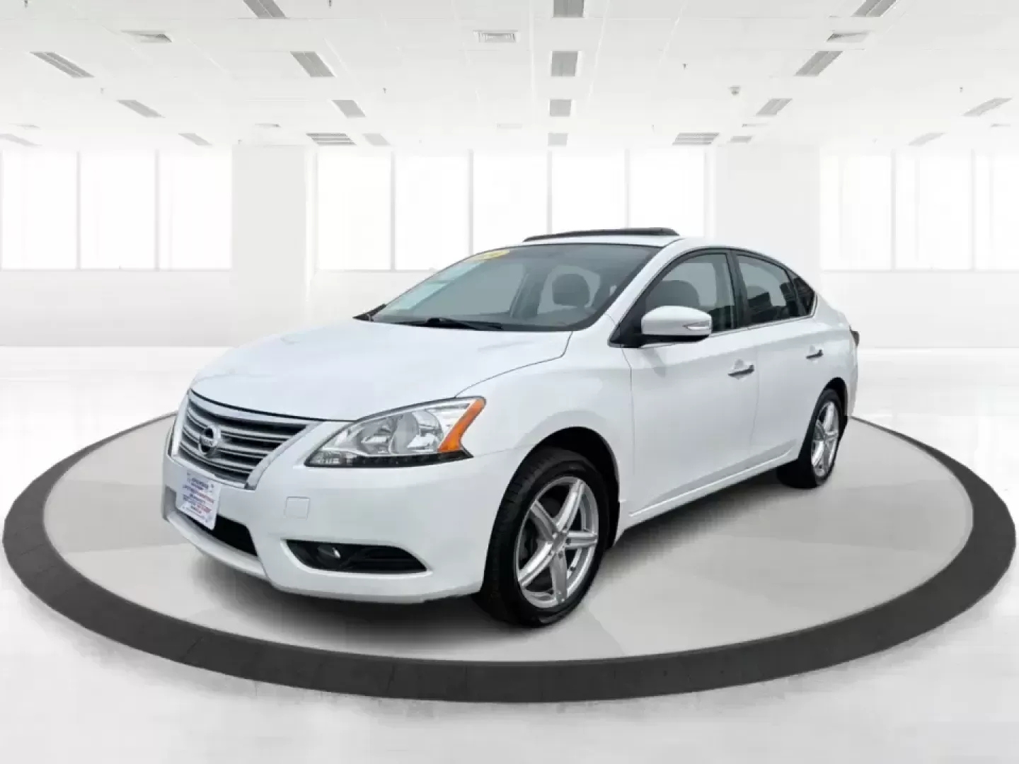 2014 Nissan Sentra SL (3N1AB7AP6EY) with an 1.8L I-4 DOHC engine, 6-Speed Manual transmission, located at 1099 N County Rd 25A , Troy, OH, 45373, (937) 908-9800, 40.057079, -84.212883 - Need a dependable commuter that's easy to park downtown, sips regular unleaded, and still feels comfortable for weekend getaways? This 2014 Nissan Sentra SL in Aspen White is a smart pick for Troy-area drivers who want a practical sedan with upscale touches and a driver-engaged feel thanks to its 6- - Photo#8
