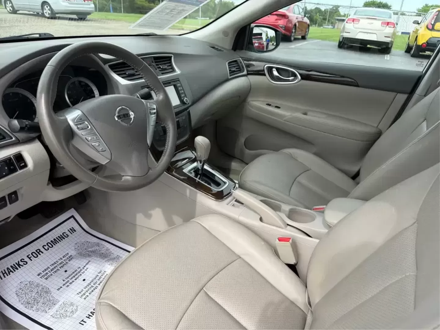 2014 Nissan Sentra SL (3N1AB7AP6EY) with an 1.8L I-4 DOHC engine, 6-Speed Manual transmission, located at 1099 N County Rd 25A , Troy, OH, 45373, (937) 908-9800, 40.057079, -84.212883 - Need a dependable commuter that's easy to park downtown, sips regular unleaded, and still feels comfortable for weekend getaways? This 2014 Nissan Sentra SL in Aspen White is a smart pick for Troy-area drivers who want a practical sedan with upscale touches and a driver-engaged feel thanks to its 6- - Photo#9