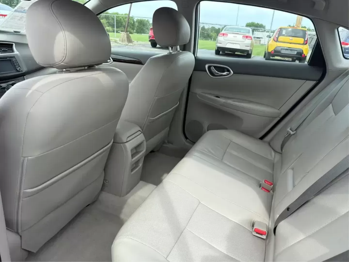 2014 Nissan Sentra SL (3N1AB7AP6EY) with an 1.8L I-4 DOHC engine, 6-Speed Manual transmission, located at 1099 N County Rd 25A , Troy, OH, 45373, (937) 908-9800, 40.057079, -84.212883 - Need a dependable commuter that's easy to park downtown, sips regular unleaded, and still feels comfortable for weekend getaways? This 2014 Nissan Sentra SL in Aspen White is a smart pick for Troy-area drivers who want a practical sedan with upscale touches and a driver-engaged feel thanks to its 6- - Photo#10