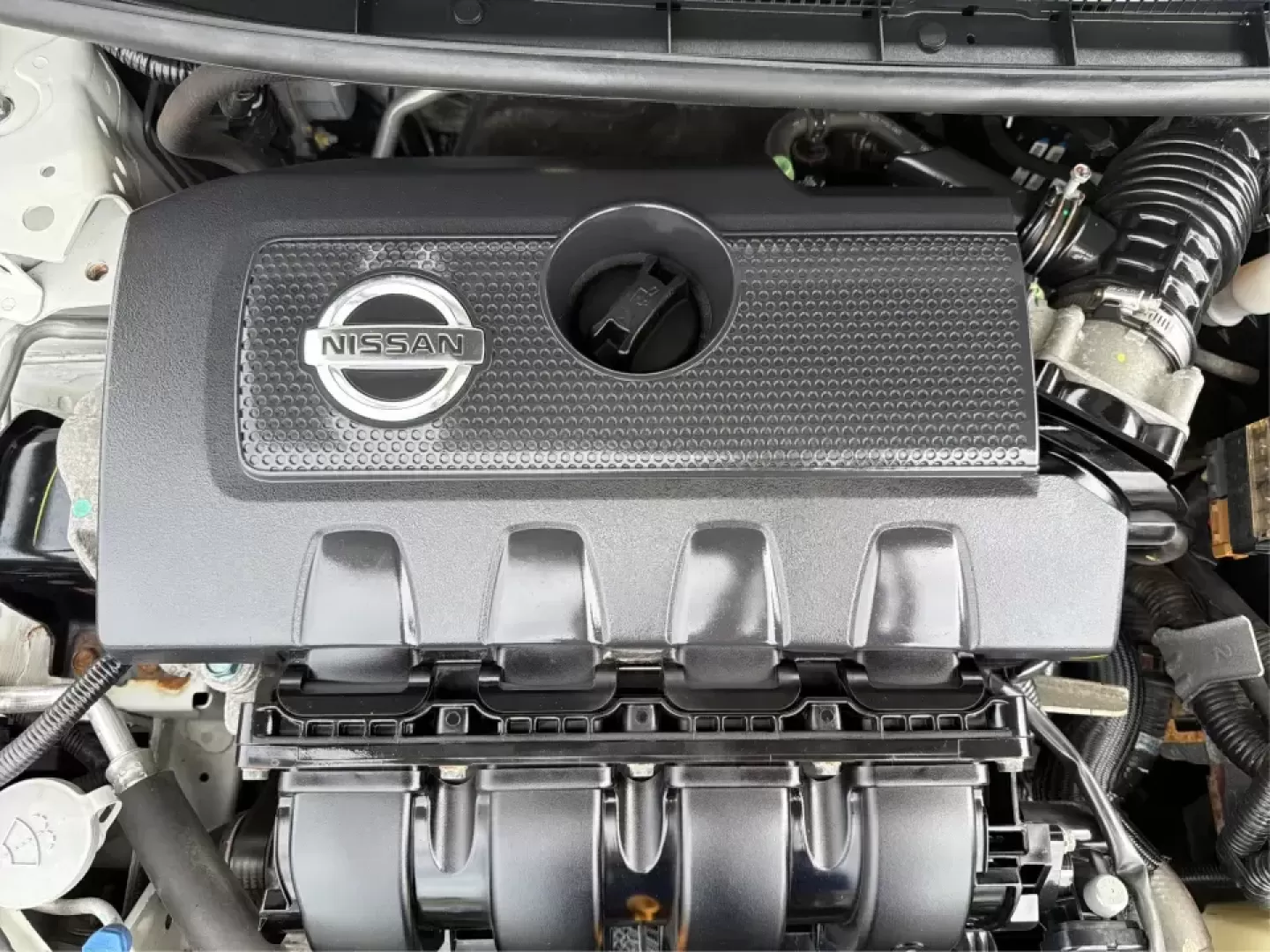 2014 Nissan Sentra SL (3N1AB7AP6EY) with an 1.8L I-4 DOHC engine, 6-Speed Manual transmission, located at 1099 N County Rd 25A , Troy, OH, 45373, (937) 908-9800, 40.057079, -84.212883 - Need a dependable commuter that's easy to park downtown, sips regular unleaded, and still feels comfortable for weekend getaways? This 2014 Nissan Sentra SL in Aspen White is a smart pick for Troy-area drivers who want a practical sedan with upscale touches and a driver-engaged feel thanks to its 6- - Photo#11