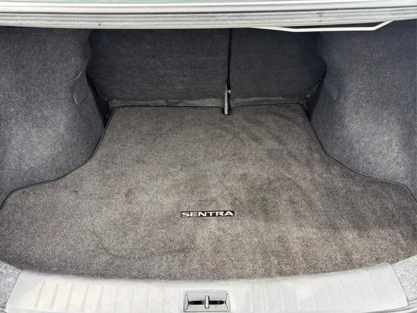 2014 Nissan Sentra SL (3N1AB7AP6EY) with an 1.8L I-4 DOHC engine, 6-Speed Manual transmission, located at 1099 N County Rd 25A , Troy, OH, 45373, (937) 908-9800, 40.057079, -84.212883 - Need a dependable commuter that's easy to park downtown, sips regular unleaded, and still feels comfortable for weekend getaways? This 2014 Nissan Sentra SL in Aspen White is a smart pick for Troy-area drivers who want a practical sedan with upscale touches and a driver-engaged feel thanks to its 6- - Photo#12