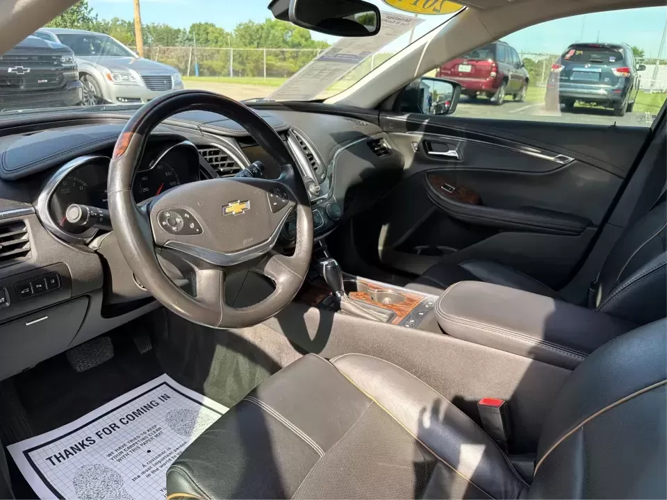 2014 Chevrolet Impala 1LZ (2G1145SL1E9) with an 2.5L L4 DOHC 16V engine, 6-Speed Automatic transmission, located at 8750 N County Rd 25A, Piqua, OH, 45356, (937) 908-9800, 40.164391, -84.232513 - Need a comfortable, confident commuter that can also handle weekend road trips up I75 without draining your budget? This 2014 Chevrolet Impala 1LZ in sleek Black is built for real life in West Central Ohio-whether you're doing the daily drive to Troy or Dayton, shuttling kids to activities, or headi - Photo#9