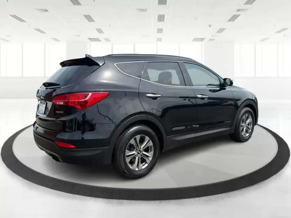 2016 Hyundai Santa Fe 2.4L (5XYZU3LB5GG) with an Theta II 2.4L I-4 gasoline direct injection engine, 6-Speed Automatic transmission, located at 8750 N County Rd 25A, Piqua, OH, 45356, (937) 908-9800, 40.164391, -84.232513 - Load up the family, point the hood toward a weekend at John Bryan State Park, or make the daily commute from Xenia to Beavercreek feel more comfortable-this 2016 Hyundai Santa Fe 2.4L is the kind of SUV that fits real life. With three-row versatility in a right-sized footprint, it's ideal for school - Photo#2