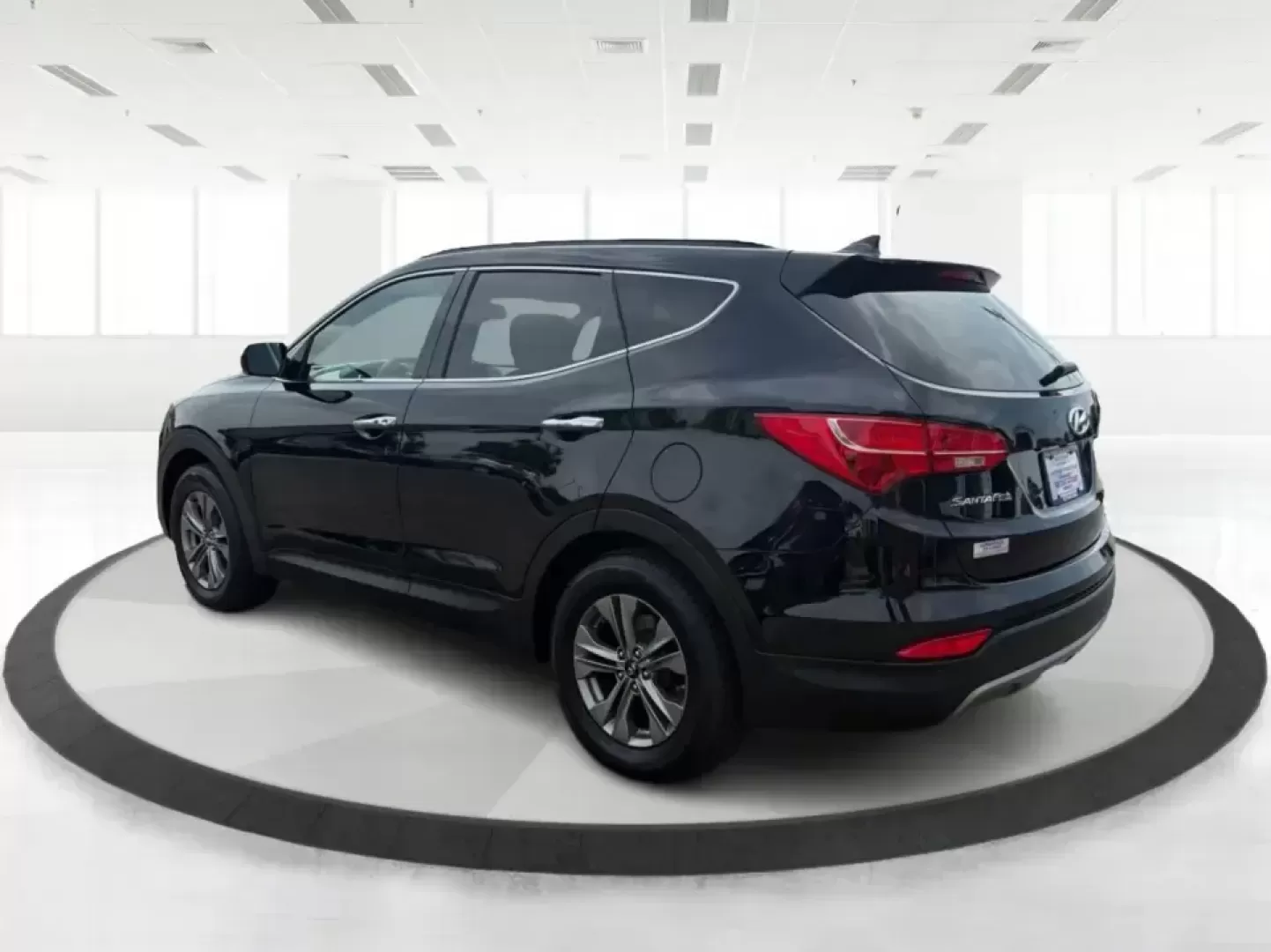 2016 Hyundai Santa Fe 2.4L (5XYZU3LB5GG) with an Theta II 2.4L I-4 gasoline direct injection engine, 6-Speed Automatic transmission, located at 1951 S Dayton Lakeview Rd., New Carlisle, OH, 45344, (937) 908-9800, 39.890999, -84.050255 - Load up the family, point the hood toward a weekend at John Bryan State Park, or make the daily commute from Xenia to Beavercreek feel more comfortable-this 2016 Hyundai Santa Fe 2.4L is the kind of SUV that fits real life. With three-row versatility in a right-sized footprint, it's ideal for school - Photo#4