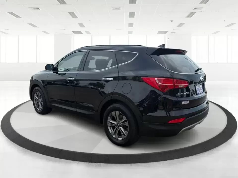 2016 Hyundai Santa Fe 2.4L (5XYZU3LB5GG) with an Theta II 2.4L I-4 gasoline direct injection engine, 6-Speed Automatic transmission, located at 8750 N County Rd 25A, Piqua, OH, 45356, (937) 908-9800, 40.164391, -84.232513 - Load up the family, point the hood toward a weekend at John Bryan State Park, or make the daily commute from Xenia to Beavercreek feel more comfortable-this 2016 Hyundai Santa Fe 2.4L is the kind of SUV that fits real life. With three-row versatility in a right-sized footprint, it's ideal for school - Photo#4