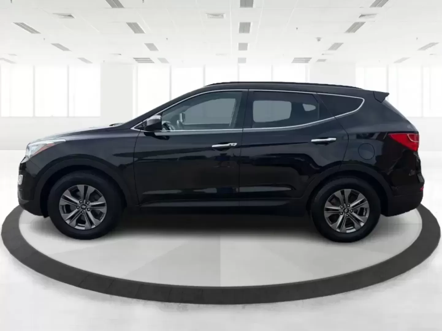 2016 Hyundai Santa Fe 2.4L (5XYZU3LB5GG) with an Theta II 2.4L I-4 gasoline direct injection engine, 6-Speed Automatic transmission, located at 1951 S Dayton Lakeview Rd., New Carlisle, OH, 45344, (937) 908-9800, 39.890999, -84.050255 - Load up the family, point the hood toward a weekend at John Bryan State Park, or make the daily commute from Xenia to Beavercreek feel more comfortable-this 2016 Hyundai Santa Fe 2.4L is the kind of SUV that fits real life. With three-row versatility in a right-sized footprint, it's ideal for school - Photo#5