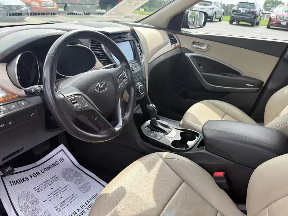 2016 Hyundai Santa Fe 2.4L (5XYZU3LB5GG) with an Theta II 2.4L I-4 gasoline direct injection engine, 6-Speed Automatic transmission, located at 8750 N County Rd 25A, Piqua, OH, 45356, (937) 908-9800, 40.164391, -84.232513 - Load up the family, point the hood toward a weekend at John Bryan State Park, or make the daily commute from Xenia to Beavercreek feel more comfortable-this 2016 Hyundai Santa Fe 2.4L is the kind of SUV that fits real life. With three-row versatility in a right-sized footprint, it's ideal for school - Photo#9
