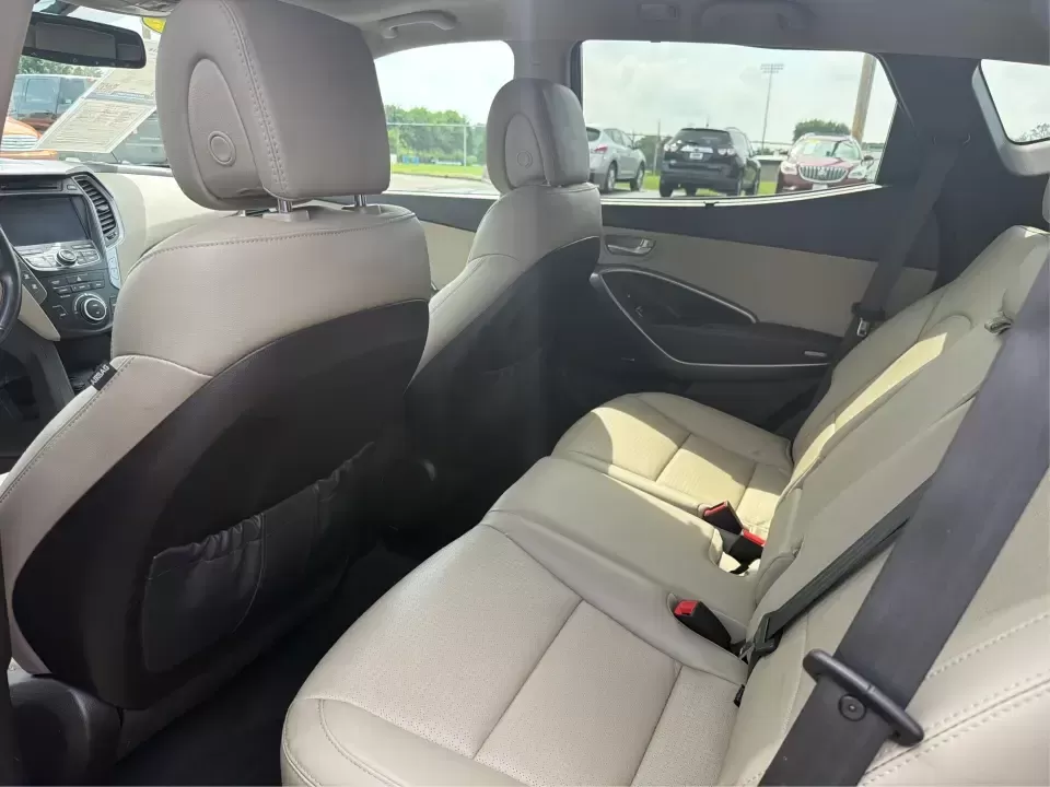 2016 Hyundai Santa Fe 2.4L (5XYZU3LB5GG) with an Theta II 2.4L I-4 gasoline direct injection engine, 6-Speed Automatic transmission, located at 8750 N County Rd 25A, Piqua, OH, 45356, (937) 908-9800, 40.164391, -84.232513 - Load up the family, point the hood toward a weekend at John Bryan State Park, or make the daily commute from Xenia to Beavercreek feel more comfortable-this 2016 Hyundai Santa Fe 2.4L is the kind of SUV that fits real life. With three-row versatility in a right-sized footprint, it's ideal for school - Photo#10