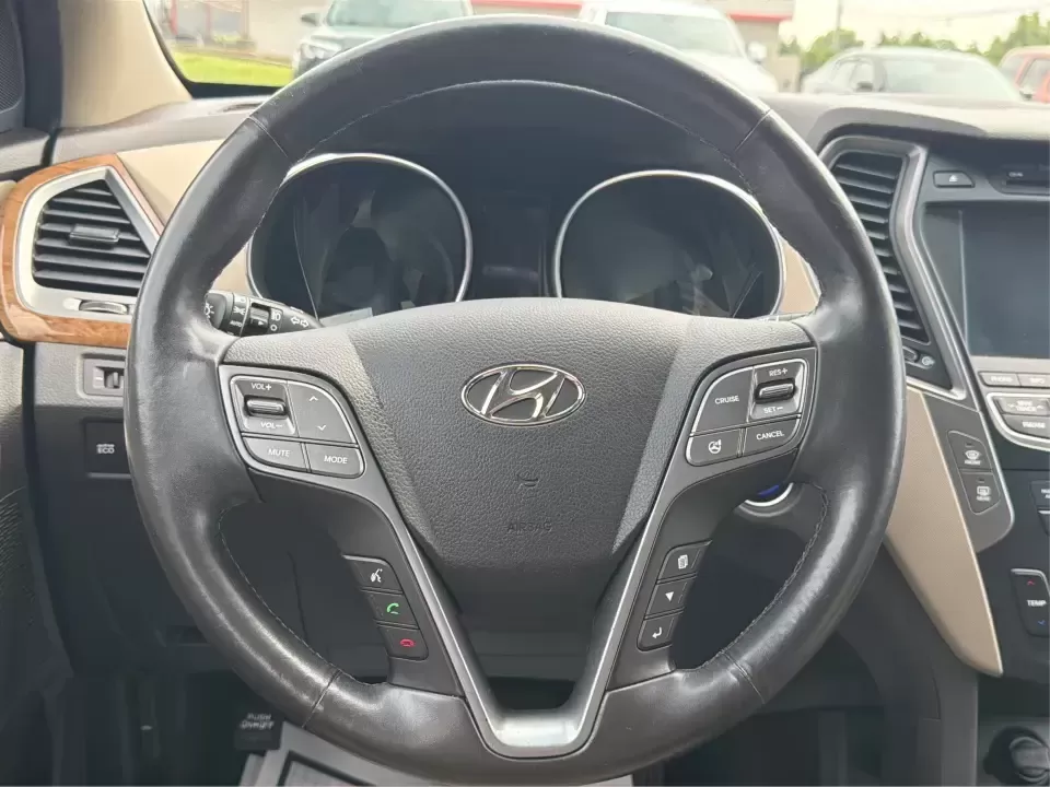 2016 Hyundai Santa Fe 2.4L (5XYZU3LB5GG) with an Theta II 2.4L I-4 gasoline direct injection engine, 6-Speed Automatic transmission, located at 8750 N County Rd 25A, Piqua, OH, 45356, (937) 908-9800, 40.164391, -84.232513 - Load up the family, point the hood toward a weekend at John Bryan State Park, or make the daily commute from Xenia to Beavercreek feel more comfortable-this 2016 Hyundai Santa Fe 2.4L is the kind of SUV that fits real life. With three-row versatility in a right-sized footprint, it's ideal for school - Photo#16
