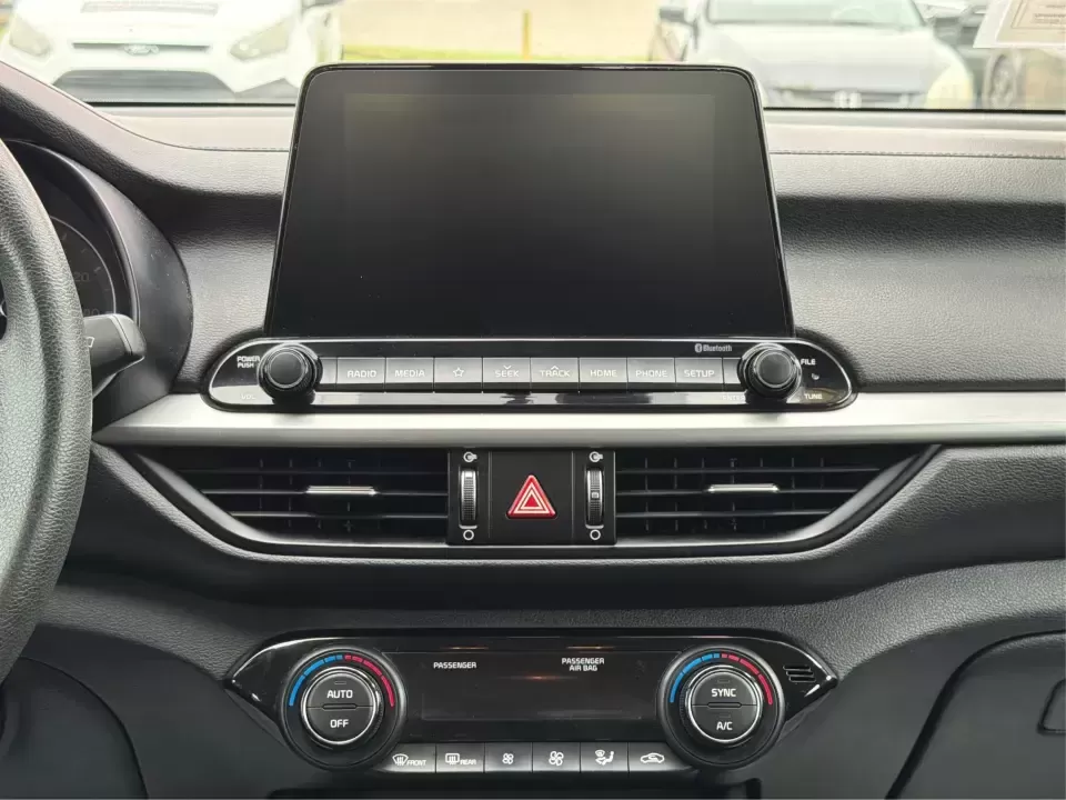 2019 Kia Forte LXS (3KPF24AD0KE) with an 2L I-4 DOHC engine, 6A transmission, located at 1099 N County Rd 25A , Troy, OH, 45373, (937) 908-9800, 40.057079, -84.212883 - Need a dependable commuter that still feels sharp for date nights in downtown Troy or quick weekend getaways out toward Miami County backroads? This **2019 Kia Forte LXS** in eye-catching **Currant Red** is a smart, budget-friendly sedan built for daily life-easy to park, comfortable for longer driv - Photo#13