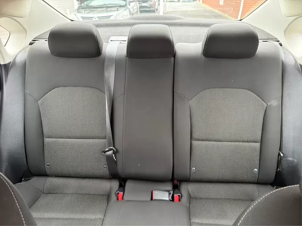 2019 Kia Forte LXS (3KPF24AD0KE) with an 2L I-4 DOHC engine, 6A transmission, located at 1099 N County Rd 25A , Troy, OH, 45373, (937) 908-9800, 40.057079, -84.212883 - Need a dependable commuter that still feels sharp for date nights in downtown Troy or quick weekend getaways out toward Miami County backroads? This **2019 Kia Forte LXS** in eye-catching **Currant Red** is a smart, budget-friendly sedan built for daily life-easy to park, comfortable for longer driv - Photo#14