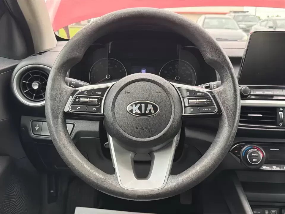 2019 Kia Forte LXS (3KPF24AD0KE) with an 2L I-4 DOHC engine, 6A transmission, located at 1099 N County Rd 25A , Troy, OH, 45373, (937) 908-9800, 40.057079, -84.212883 - Need a dependable commuter that still feels sharp for date nights in downtown Troy or quick weekend getaways out toward Miami County backroads? This **2019 Kia Forte LXS** in eye-catching **Currant Red** is a smart, budget-friendly sedan built for daily life-easy to park, comfortable for longer driv - Photo#16