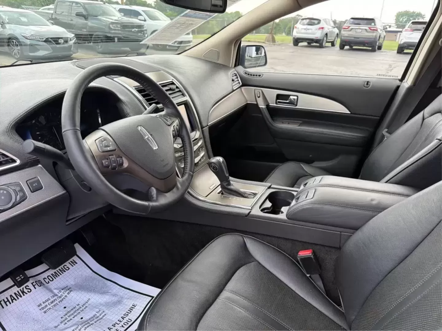 2012 Lincoln MKX Base (2LMDJ8JK1CB) with an 3.7L V6 DOHC 24V engine, 6-Speed Automatic transmission, located at 401 Woodman Dr, Riverside, OH, 45431, (937) 908-9800, 39.760899, -84.123421 - Need a comfortable, confident SUV for daily commuting to Wright-Patterson AFB, school drop-offs in Beavercreek, and weekend runs to The Greene or Carillon Historical Park? This 2012 Lincoln MKX Base in classic Silver delivers the kind of quiet ride, upscale comfort, and V6 power that makes errands f - Photo#9