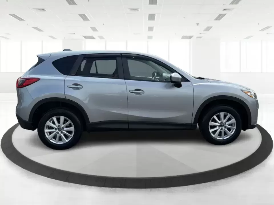 2014 Mazda CX-5 Touring (JM3KE2CYXE0) with an SKYACTIV-G 2.5L I-4 gasoline direct injection engine, 6-Speed Automatic transmission, located at 401 Woodman Dr, Riverside, OH, 45431, (937) 908-9800, 39.760899, -84.123421 - 2014 Mazda CX-5 Touring - Photo#1
