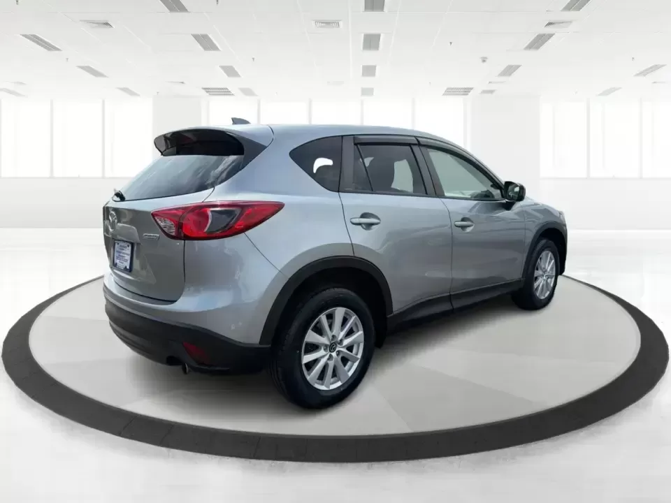 2014 Mazda CX-5 Touring (JM3KE2CYXE0) with an SKYACTIV-G 2.5L I-4 gasoline direct injection engine, 6-Speed Automatic transmission, located at 401 Woodman Dr, Riverside, OH, 45431, (937) 908-9800, 39.760899, -84.123421 - 2014 Mazda CX-5 Touring - Photo#2