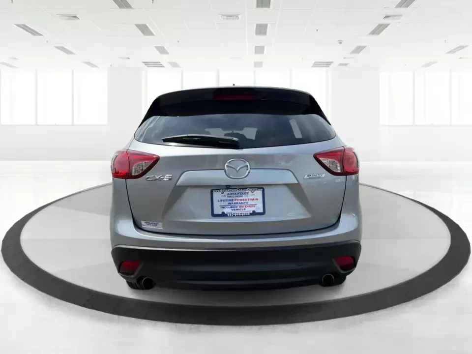 2014 Mazda CX-5 Touring (JM3KE2CYXE0) with an SKYACTIV-G 2.5L I-4 gasoline direct injection engine, 6-Speed Automatic transmission, located at 401 Woodman Dr, Riverside, OH, 45431, (937) 908-9800, 39.760899, -84.123421 - 2014 Mazda CX-5 Touring - Photo#3