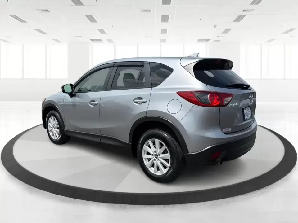 2014 Mazda CX-5 Touring (JM3KE2CYXE0) with an SKYACTIV-G 2.5L I-4 gasoline direct injection engine, 6-Speed Automatic transmission, located at 401 Woodman Dr, Riverside, OH, 45431, (937) 908-9800, 39.760899, -84.123421 - 2014 Mazda CX-5 Touring - Photo#4