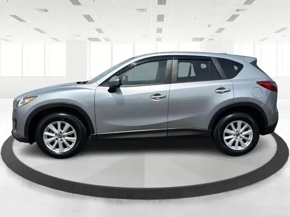 2014 Mazda CX-5 Touring (JM3KE2CYXE0) with an SKYACTIV-G 2.5L I-4 gasoline direct injection engine, 6-Speed Automatic transmission, located at 401 Woodman Dr, Riverside, OH, 45431, (937) 908-9800, 39.760899, -84.123421 - 2014 Mazda CX-5 Touring - Photo#5