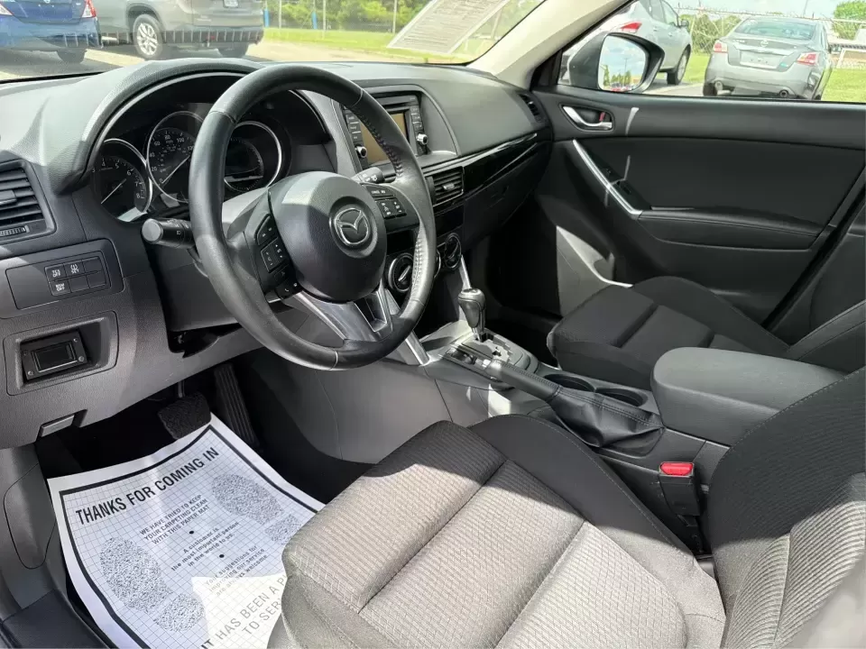 2014 Mazda CX-5 Touring (JM3KE2CYXE0) with an SKYACTIV-G 2.5L I-4 gasoline direct injection engine, 6-Speed Automatic transmission, located at 401 Woodman Dr, Riverside, OH, 45431, (937) 908-9800, 39.760899, -84.123421 - 2014 Mazda CX-5 Touring - Photo#9