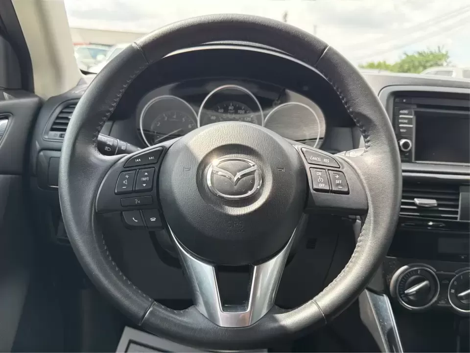 2014 Mazda CX-5 Touring (JM3KE2CYXE0) with an SKYACTIV-G 2.5L I-4 gasoline direct injection engine, 6-Speed Automatic transmission, located at 401 Woodman Dr, Riverside, OH, 45431, (937) 908-9800, 39.760899, -84.123421 - 2014 Mazda CX-5 Touring - Photo#16