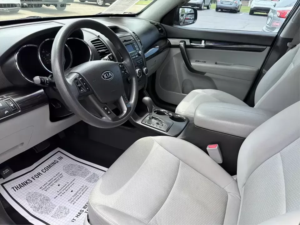 2013 Kia Sorento LX (5XYKTCA63DG) with an 2.4L I-4 gasoline direct injection engine, 6-Speed Automatic transmission, located at 1230 East Main St, Xenia, OH, 45385, (937) 908-9800, 39.688026, -83.910172 - Ready for school drop-offs, long commutes to Dayton, and spontaneous weekend getaways to John Bryan State Park, this 2013 Kia Sorento LX is the kind of SUV that fits real life in Greene County. With confident SUV versatility, a roomy cabin, and practical features for everyday comfort, it's a smart p - Photo#9