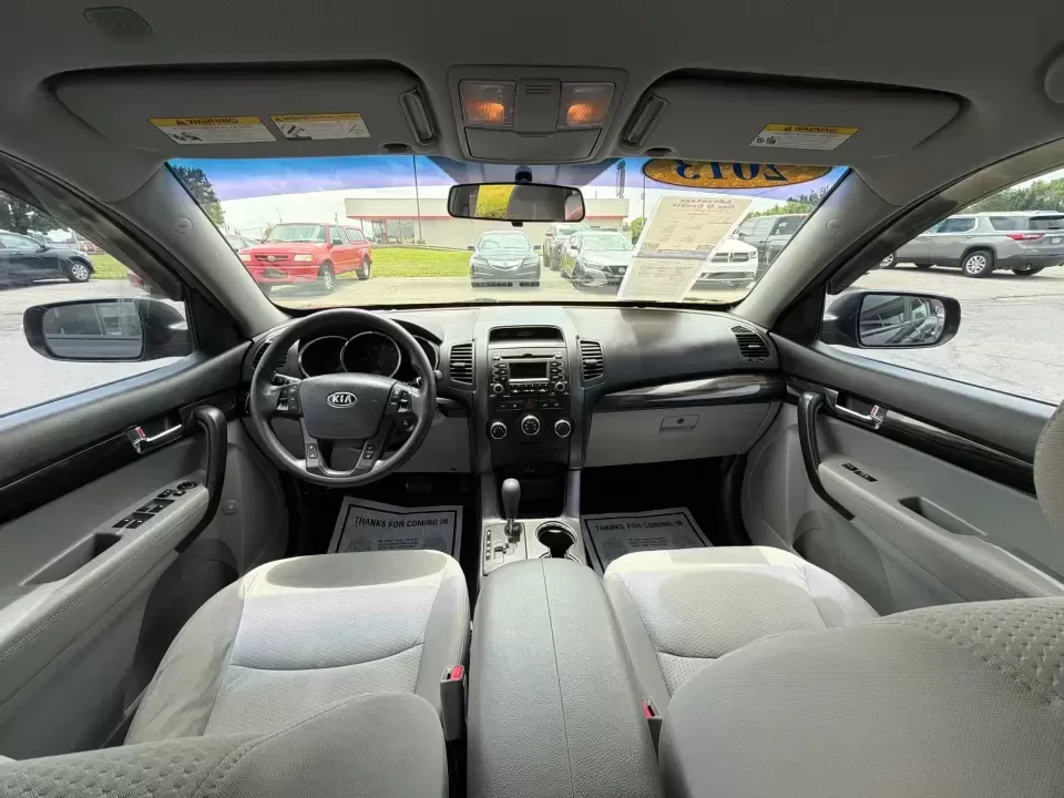 2013 Kia Sorento LX (5XYKTCA63DG) with an 2.4L I-4 gasoline direct injection engine, 6-Speed Automatic transmission, located at 1230 East Main St, Xenia, OH, 45385, (937) 908-9800, 39.688026, -83.910172 - Ready for school drop-offs, long commutes to Dayton, and spontaneous weekend getaways to John Bryan State Park, this 2013 Kia Sorento LX is the kind of SUV that fits real life in Greene County. With confident SUV versatility, a roomy cabin, and practical features for everyday comfort, it's a smart p - Photo#21