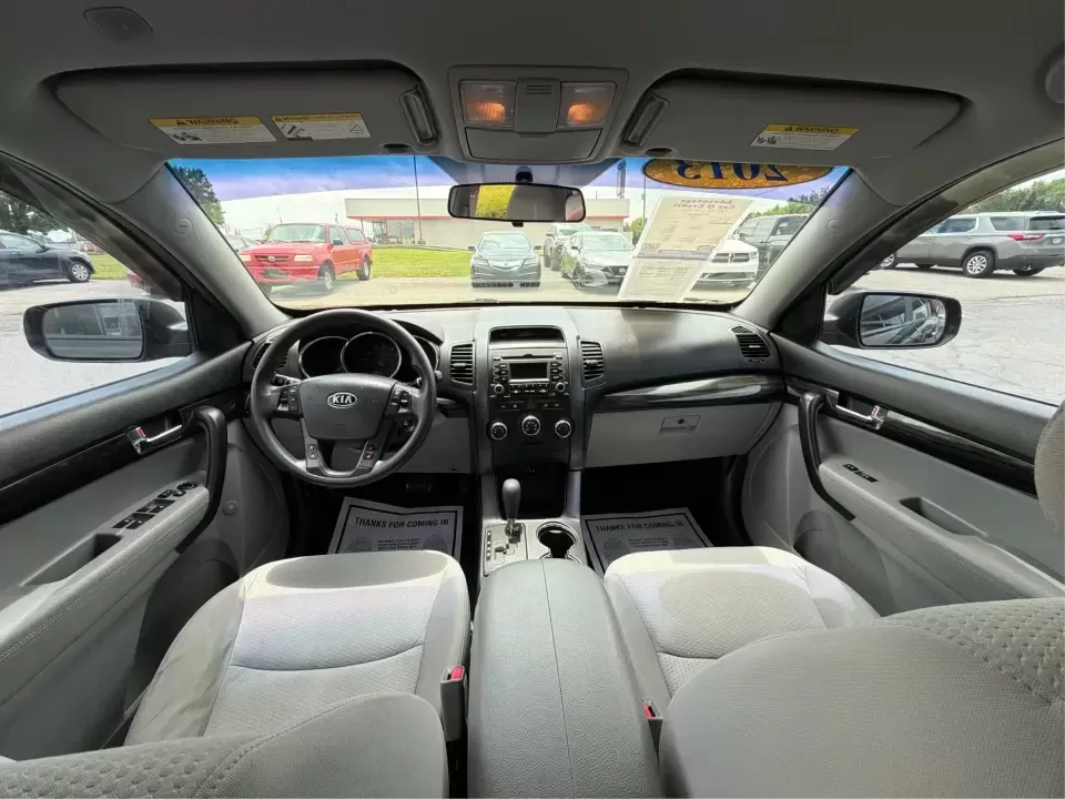 2013 Kia Sorento LX (5XYKTCA63DG) with an 2.4L I-4 gasoline direct injection engine, 6-Speed Automatic transmission, located at 1230 East Main St, Xenia, OH, 45385, (937) 908-9800, 39.688026, -83.910172 - Ready for school drop-offs, long commutes to Dayton, and spontaneous weekend getaways to John Bryan State Park, this 2013 Kia Sorento LX is the kind of SUV that fits real life in Greene County. With confident SUV versatility, a roomy cabin, and practical features for everyday comfort, it's a smart p - Photo#22