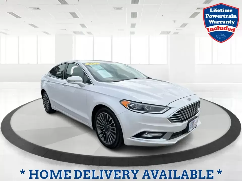 2017 Ford Fusion SE AWD (3FA6P0T99HR) with an 2.0L L4 DOHC 16V engine, 6A transmission, located at 1230 East Main St, Xenia, OH, 45385, (937) 908-9800, 39.688026, -83.910172 - Need a dependable sedan for the daily drive from Xenia to Beavercreek, Wright-Patterson AFB, or downtown Dayton-while still being comfortable enough for weekend trips to John Bryan State Park or a night out near the Greene? This 2017 Ford Fusion SE in Oxford White is a smart, commuter-friendly choic - Photo#0