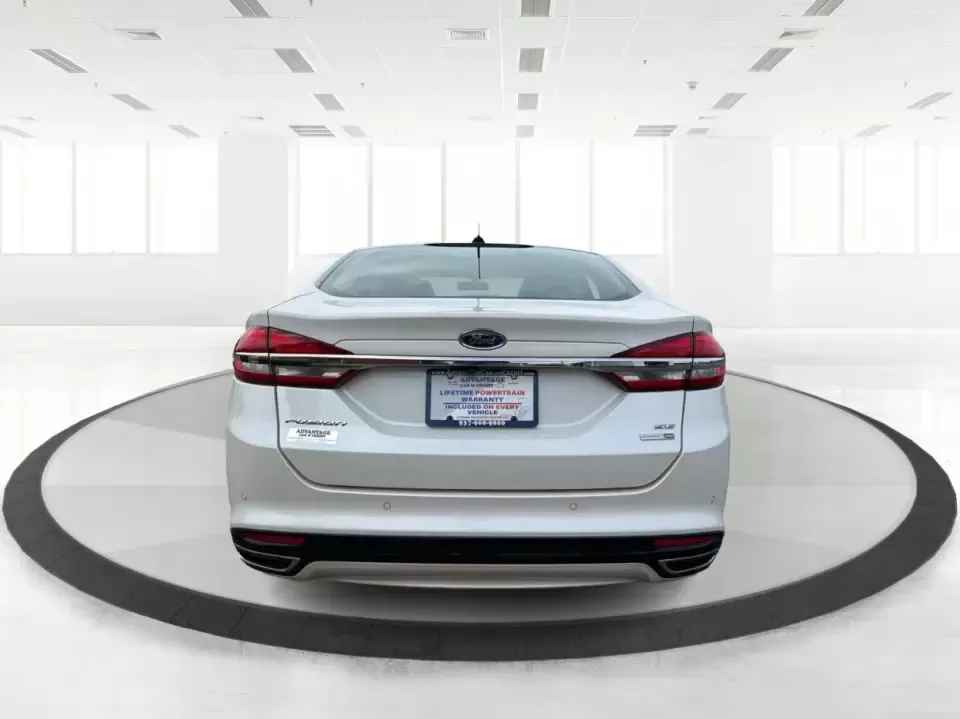 2017 Ford Fusion SE AWD (3FA6P0T99HR) with an 2.0L L4 DOHC 16V engine, 6A transmission, located at 1230 East Main St, Xenia, OH, 45385, (937) 908-9800, 39.688026, -83.910172 - Need a dependable sedan for the daily drive from Xenia to Beavercreek, Wright-Patterson AFB, or downtown Dayton-while still being comfortable enough for weekend trips to John Bryan State Park or a night out near the Greene? This 2017 Ford Fusion SE in Oxford White is a smart, commuter-friendly choic - Photo#3