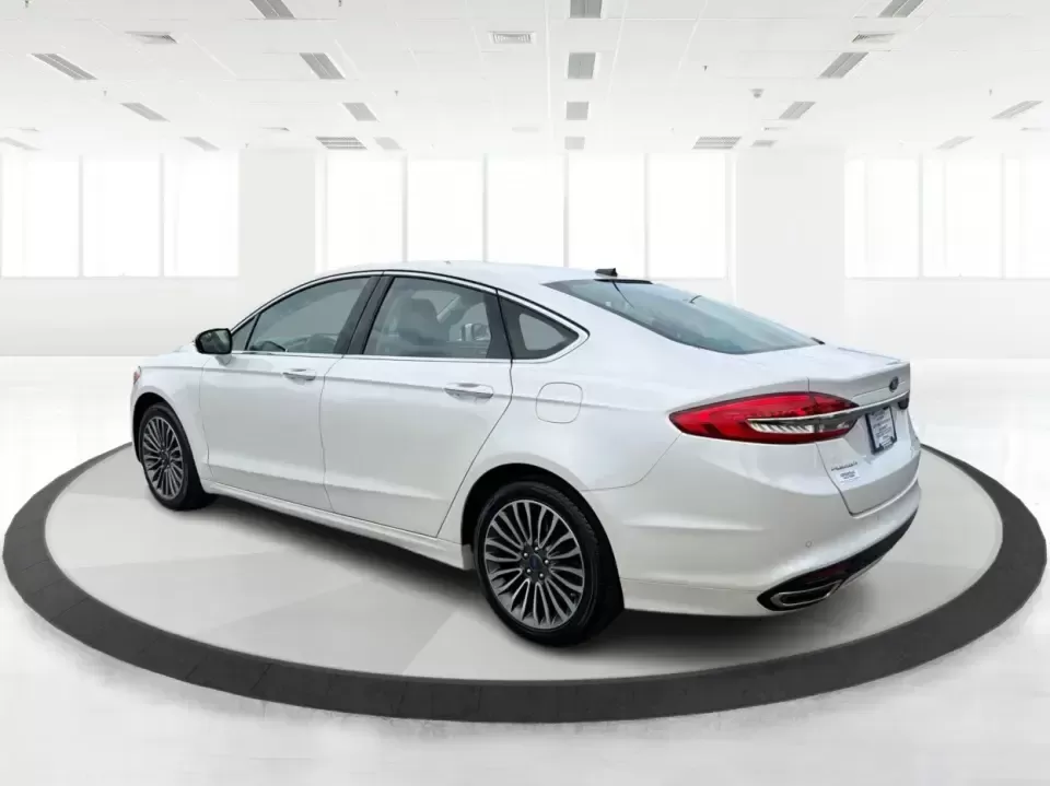 2017 Ford Fusion SE AWD (3FA6P0T99HR) with an 2.0L L4 DOHC 16V engine, 6A transmission, located at 1230 East Main St, Xenia, OH, 45385, (937) 908-9800, 39.688026, -83.910172 - Need a dependable sedan for the daily drive from Xenia to Beavercreek, Wright-Patterson AFB, or downtown Dayton-while still being comfortable enough for weekend trips to John Bryan State Park or a night out near the Greene? This 2017 Ford Fusion SE in Oxford White is a smart, commuter-friendly choic - Photo#4