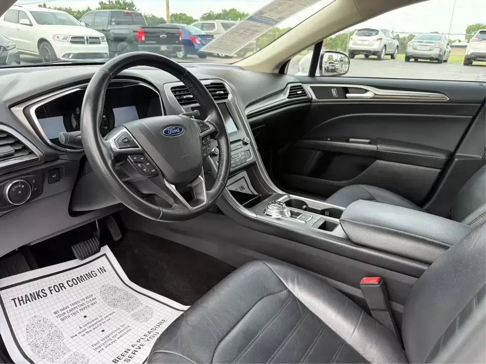 2017 Ford Fusion SE AWD (3FA6P0T99HR) with an 2.0L L4 DOHC 16V engine, 6A transmission, located at 1230 East Main St, Xenia, OH, 45385, (937) 908-9800, 39.688026, -83.910172 - Need a dependable sedan for the daily drive from Xenia to Beavercreek, Wright-Patterson AFB, or downtown Dayton-while still being comfortable enough for weekend trips to John Bryan State Park or a night out near the Greene? This 2017 Ford Fusion SE in Oxford White is a smart, commuter-friendly choic - Photo#9