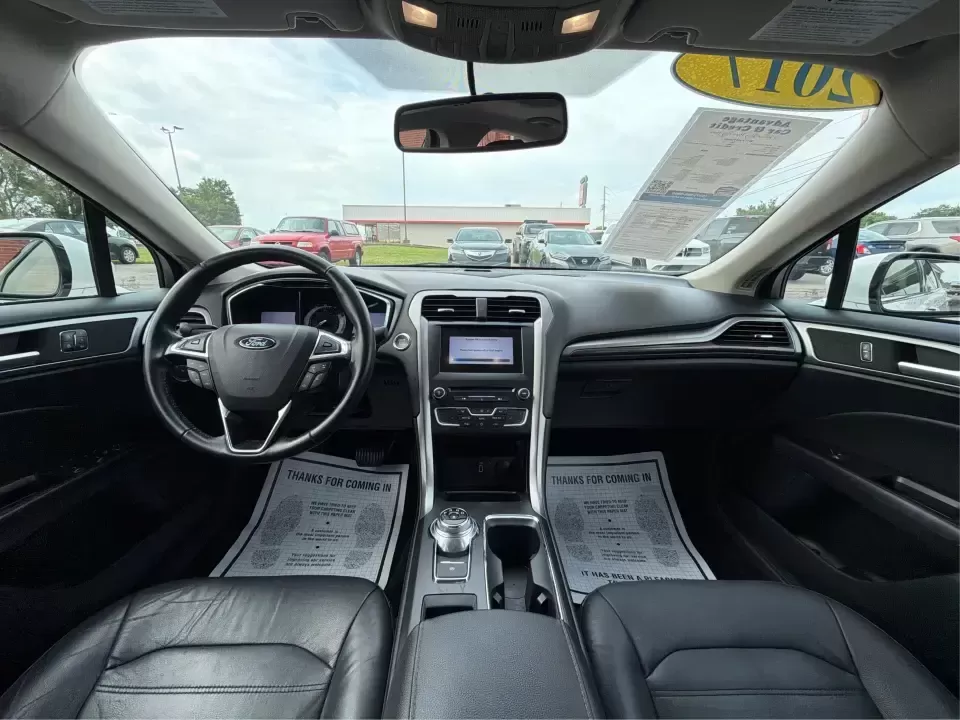 2017 Ford Fusion SE AWD (3FA6P0T99HR) with an 2.0L L4 DOHC 16V engine, 6A transmission, located at 1230 East Main St, Xenia, OH, 45385, (937) 908-9800, 39.688026, -83.910172 - Need a dependable sedan for the daily drive from Xenia to Beavercreek, Wright-Patterson AFB, or downtown Dayton-while still being comfortable enough for weekend trips to John Bryan State Park or a night out near the Greene? This 2017 Ford Fusion SE in Oxford White is a smart, commuter-friendly choic - Photo#22