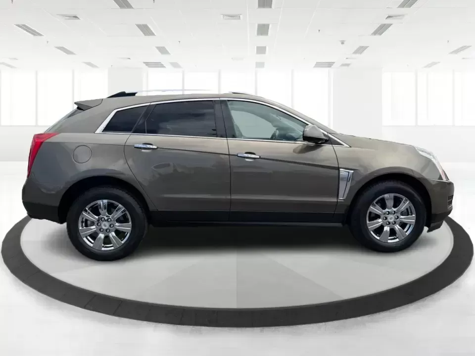 2015 Cadillac SRX Luxury Collection (3GYFNEE39FS) with an 3.6L V-6 gasoline direct injection engine, 6-Speed Automatic transmission, located at 401 Woodman Dr, Riverside, OH, 45431, (937) 908-9800, 39.760899, -84.123421 - 2015 Cadillac SRX Luxury Collection - Photo#1