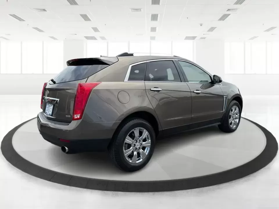 2015 Cadillac SRX Luxury Collection (3GYFNEE39FS) with an 3.6L V-6 gasoline direct injection engine, 6-Speed Automatic transmission, located at 401 Woodman Dr, Riverside, OH, 45431, (937) 908-9800, 39.760899, -84.123421 - 2015 Cadillac SRX Luxury Collection - Photo#2