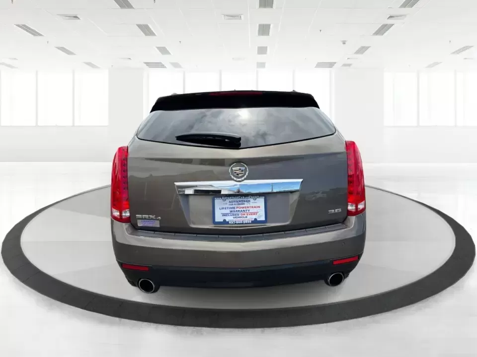 2015 Cadillac SRX Luxury Collection (3GYFNEE39FS) with an 3.6L V-6 gasoline direct injection engine, 6-Speed Automatic transmission, located at 401 Woodman Dr, Riverside, OH, 45431, (937) 908-9800, 39.760899, -84.123421 - 2015 Cadillac SRX Luxury Collection - Photo#3